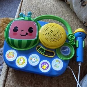 Cocomelon music carry along with microphone